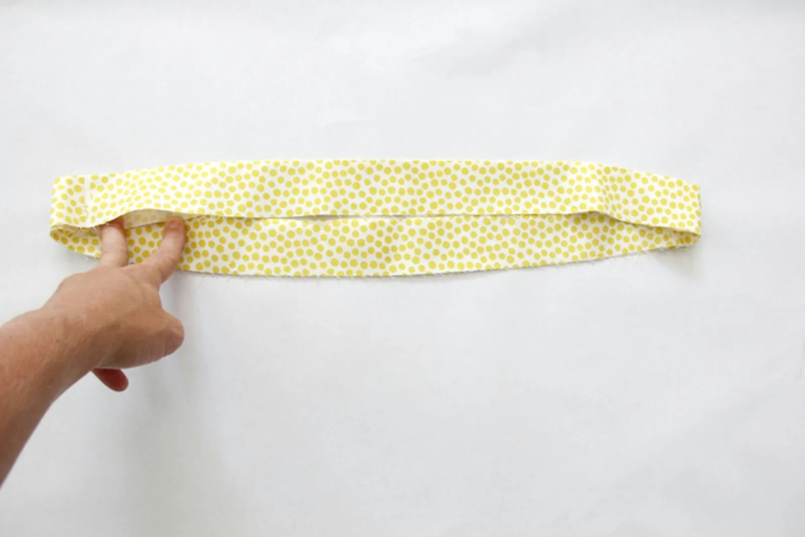 Fold the waistband in half and press