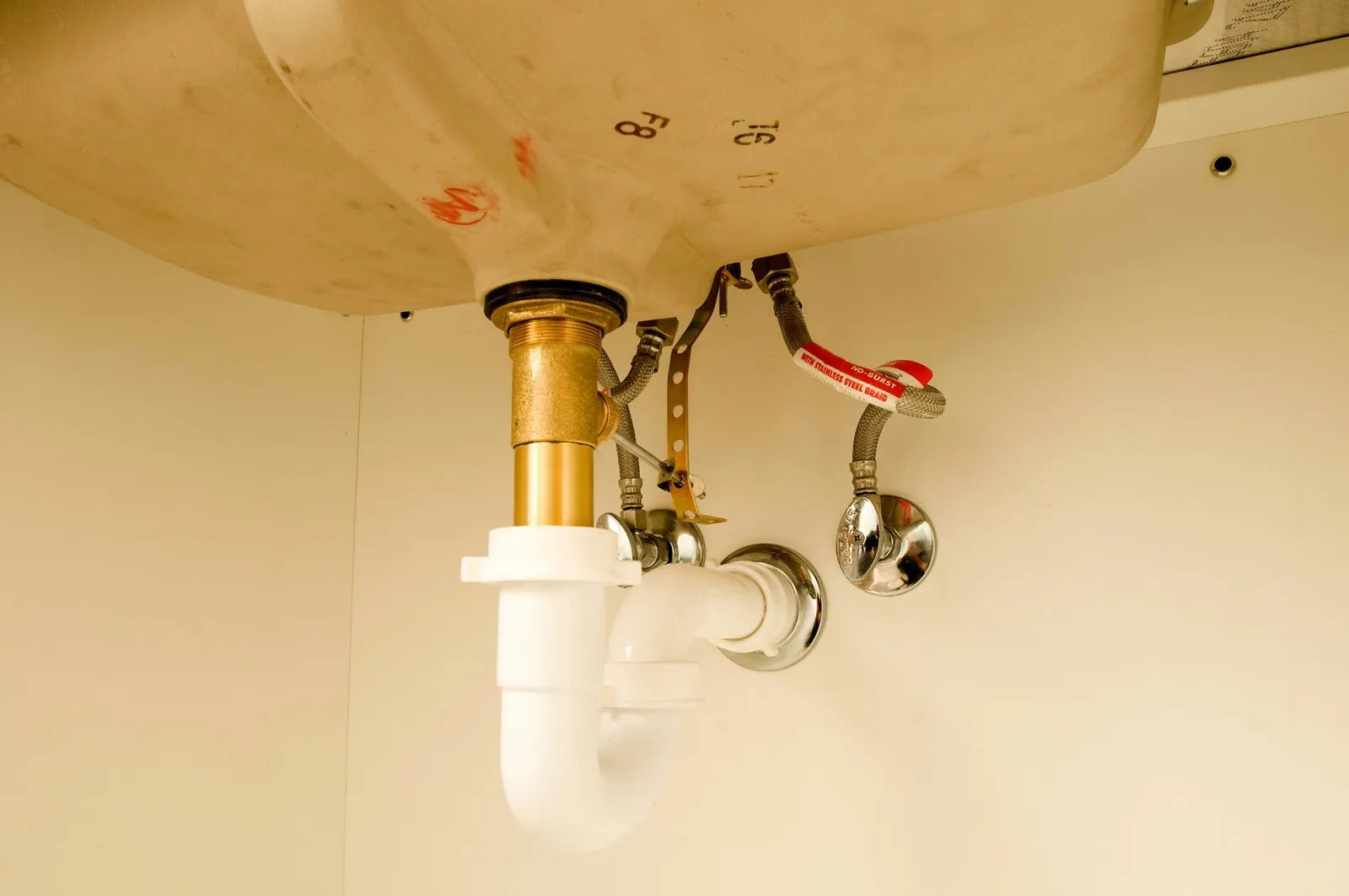 Covering Exposed Plumbing Beneath a Wall-Mounted or Pedestal Bathroom Sink