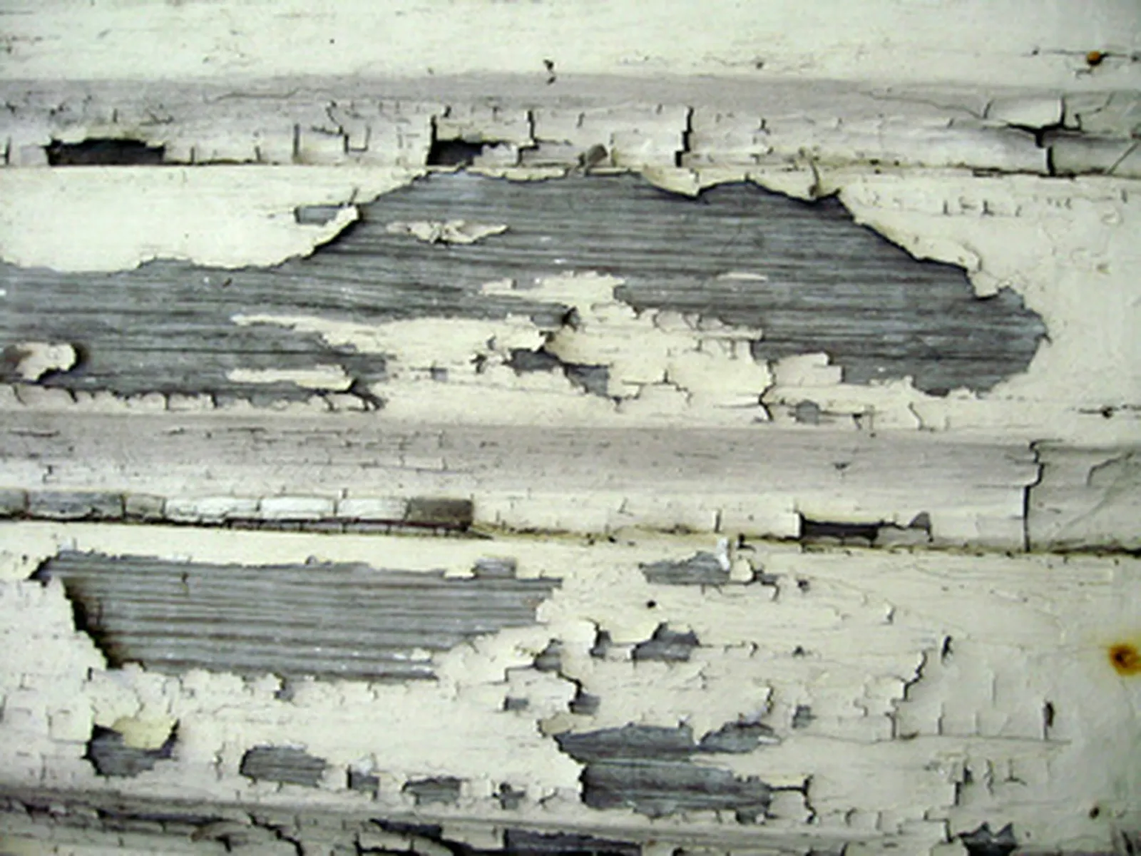 Stripping Flaky Coating Off a Door Casing