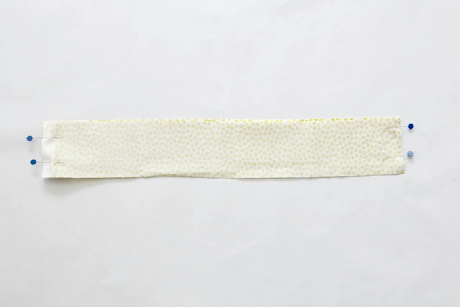 Pin waistband right sides together and sew side seam