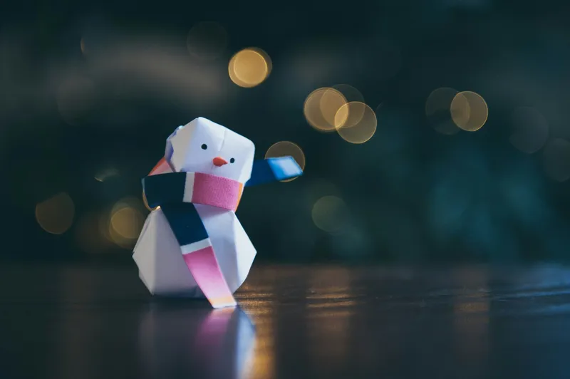 Paper origami snowman with scarf, Christmas decoration