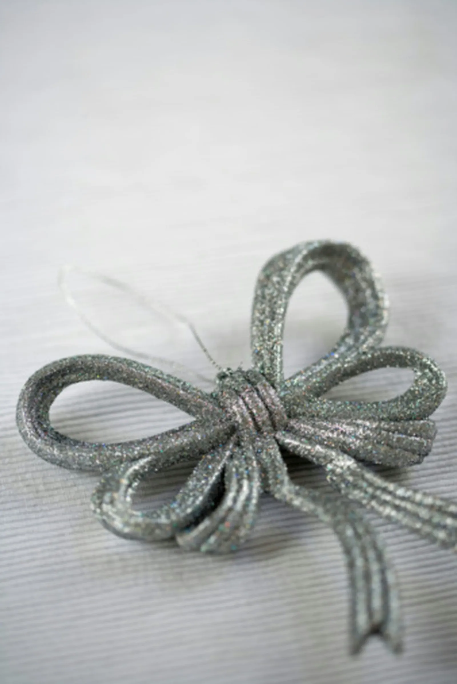 Crafting a Decorative Wreath from a Hanger and Plastic Bags