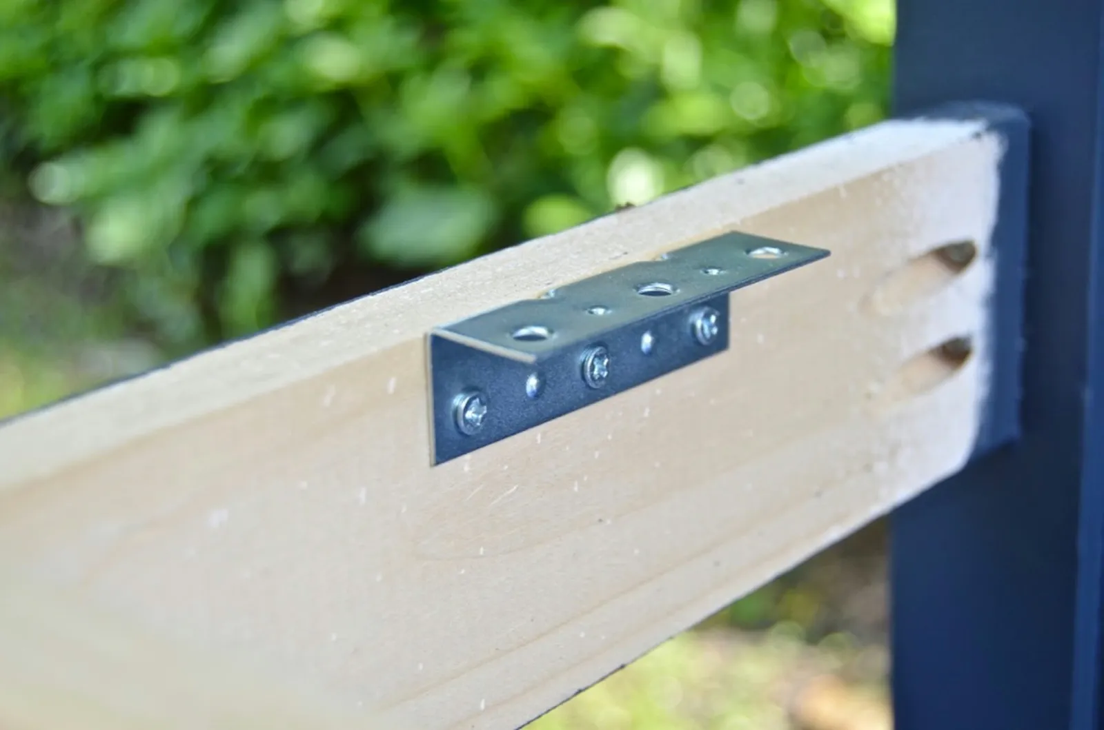 screw corner braces onto bench to support seat