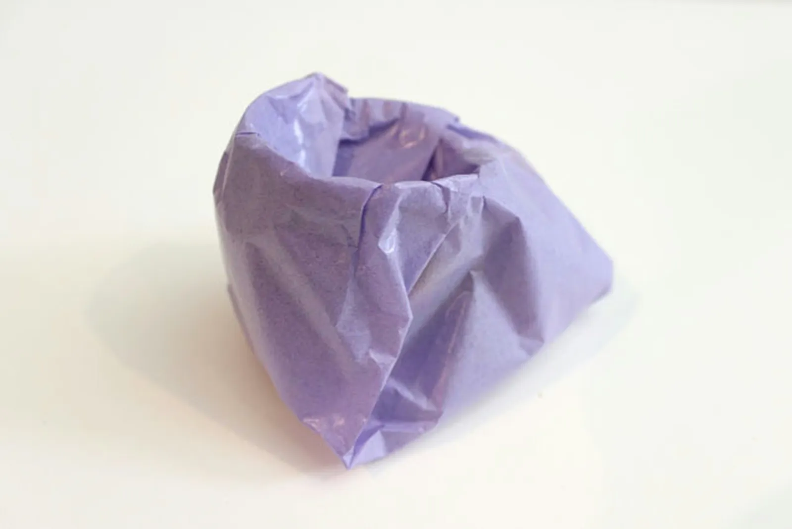 The tissue in the back overlaps the sides.
