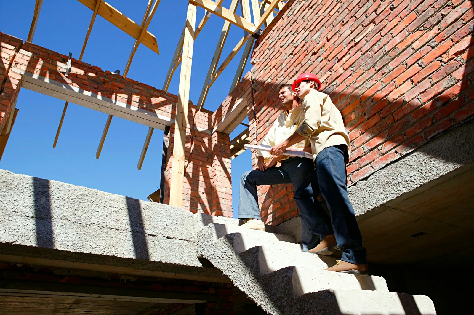 Contractor and client at construction site