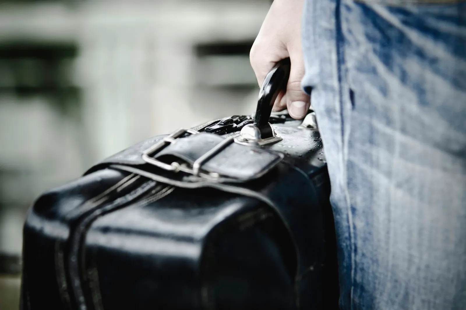 Hand holding the case