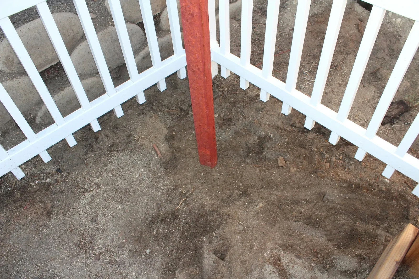 Post is secure in ground with dirt