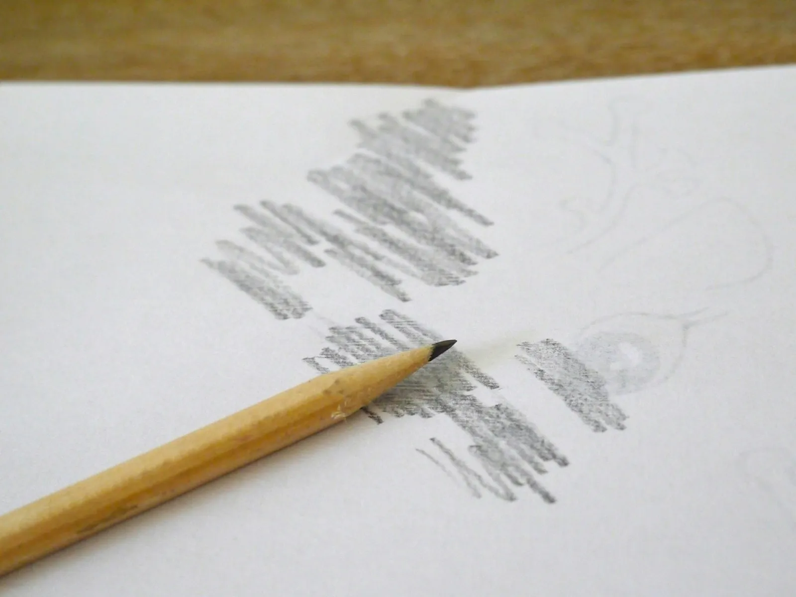 The back of the template covered in graphite pencil